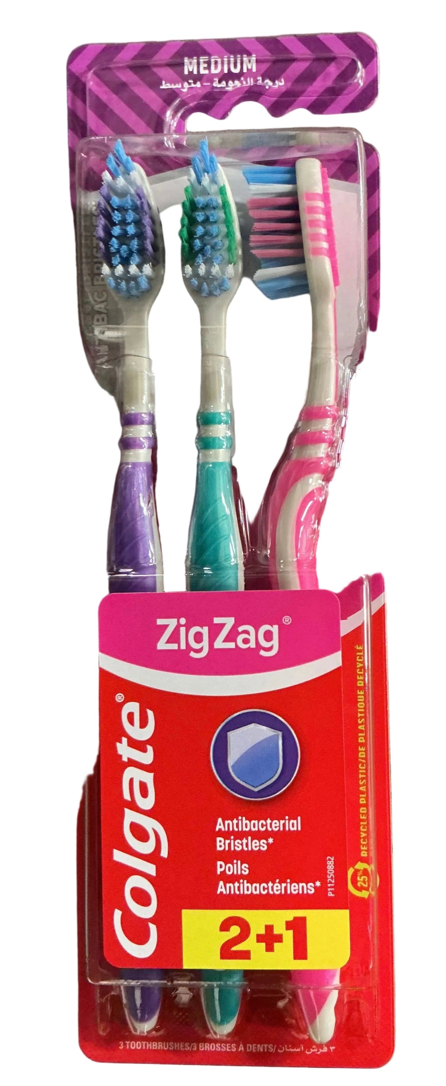 A pack of three Colgate ZigZag toothbrushes in blister packaging, featuring purple, teal, and pink handles with blue, green, and pink bristles.